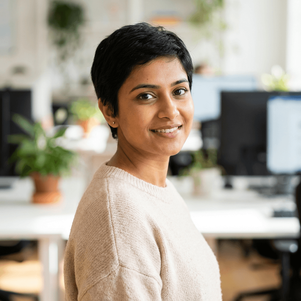 Zineb Rahil in a bright modern Toulouse office